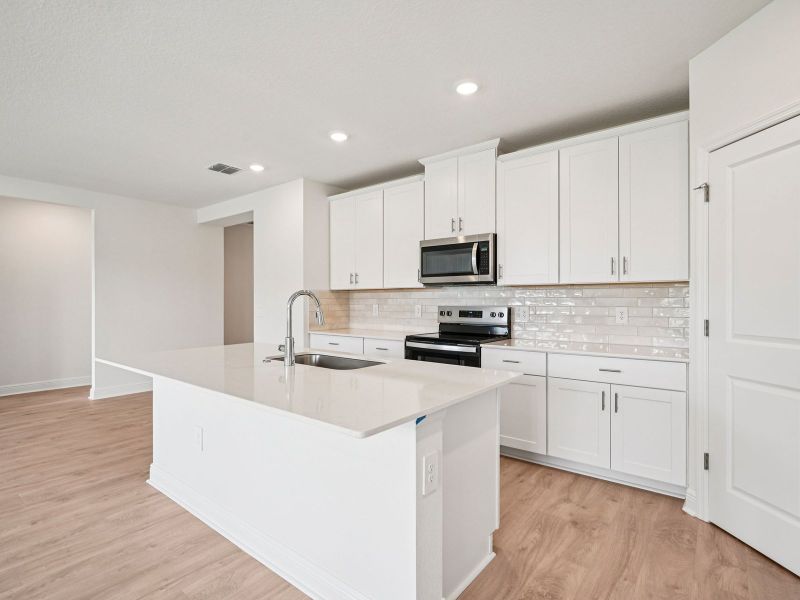 Furnished interior view inside a new home in The Reserve at Hammock Oaks - Signature Series, Lady Lake (Image 4).