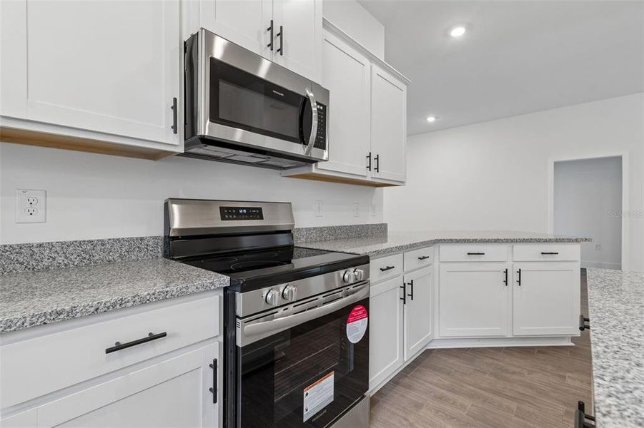 Furnished interior view inside a new home in Abbey Glen, Dade City (Image 15).