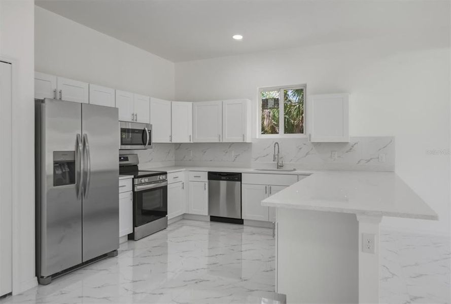 Furnished interior view inside a new home in , Punta Gorda (Image 48). Furnished interior view inside a new home in , Punta Gorda (Image 48).