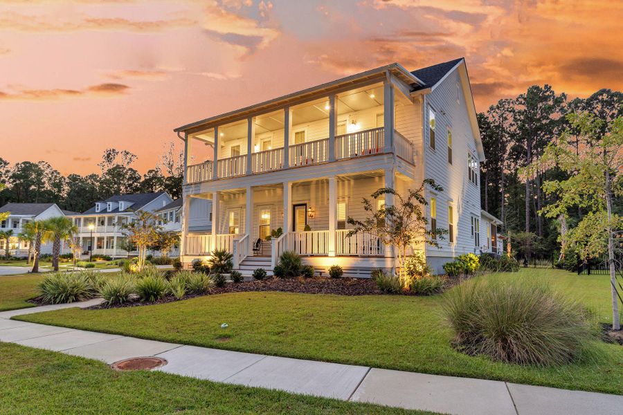 Front exterior of a new home in Carolina Park: Riverside, Mount Pleasant, SC, highlighting curb appeal (Image 20). Front exterior of a new home in Carolina Park: Riverside, Mount Pleasant, SC, highlighting curb appeal (Image 20).