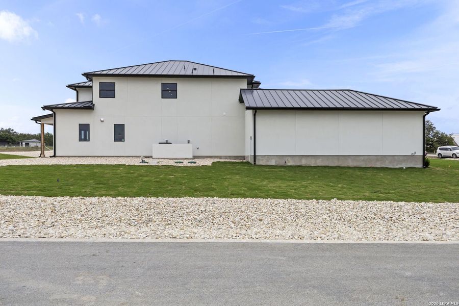 Exterior details and patio area of a home in , Bulverde (Image 33).