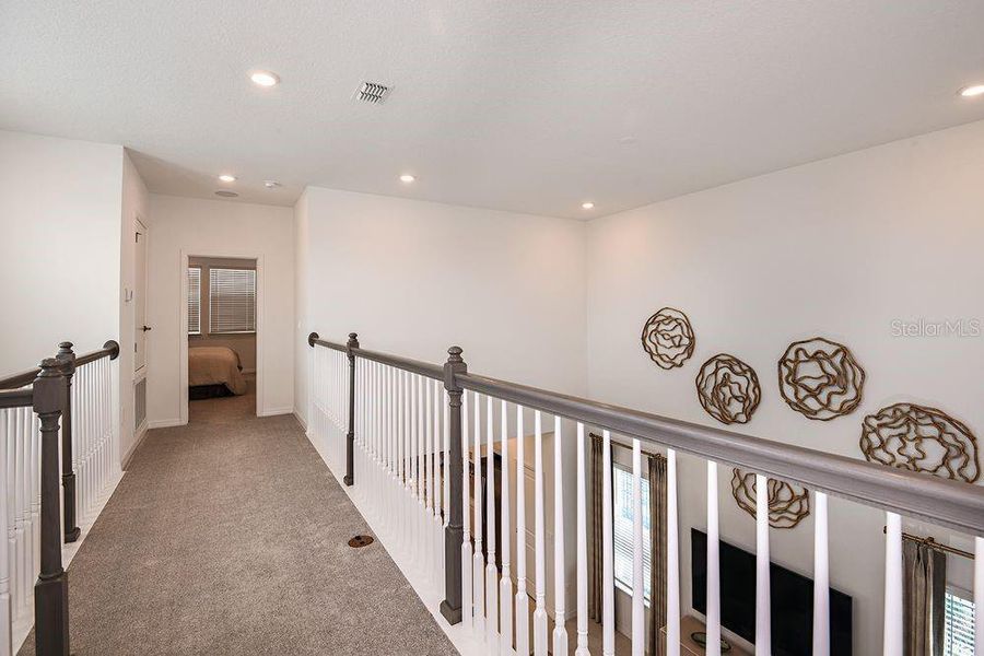 Spacious, unfurnished interior of a new home in Harvest at Ovation, Winter Garden (Image 23).