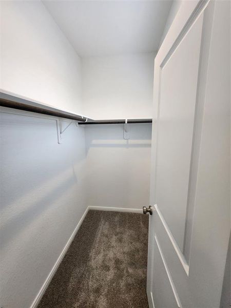 Closet to Bedroom with bathroom