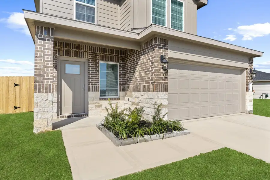 Exterior details and patio area of a home in Watermark, Alvin (Image 3). Exterior details and patio area of a home in Watermark, Alvin (Image 3).