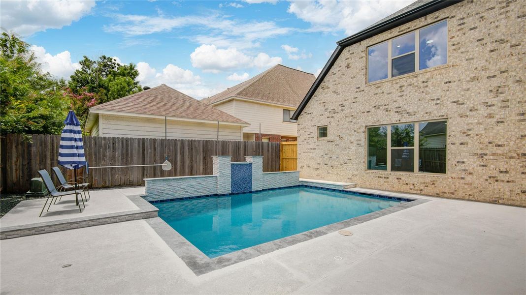 Exterior details and patio area of a home in , Spring (Image 27).