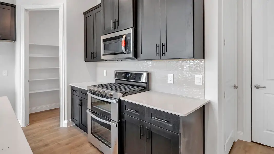 Furnished interior view inside a new home in Mustang Square, Plano (Image 3).