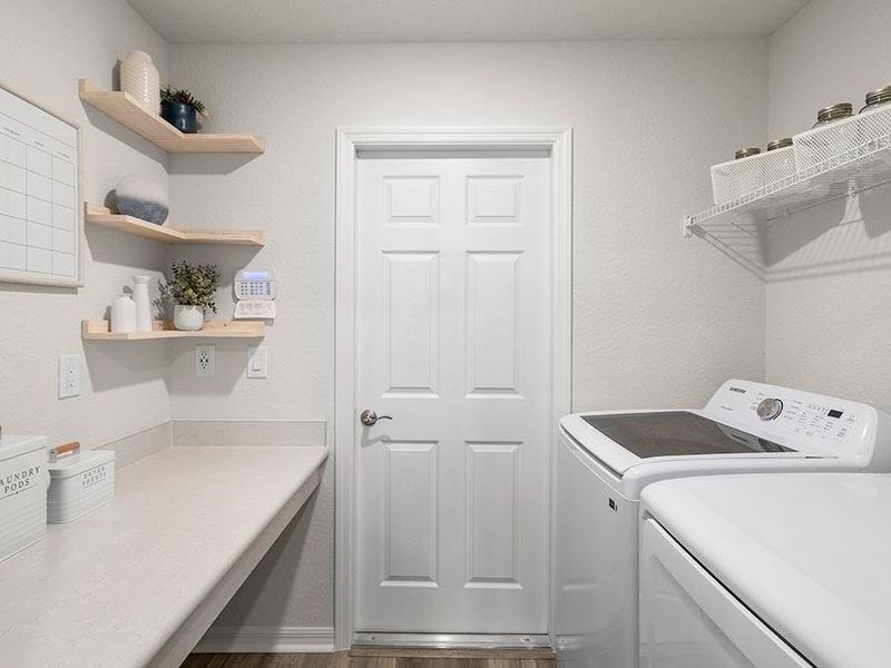 A built-in drop zone keeps clutter off the kitchen counter - Parker by Highland Homes