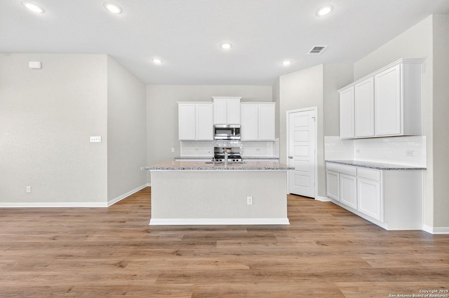 Furnished interior view inside a new home in Winding Brook, San Antonio (Image 11).