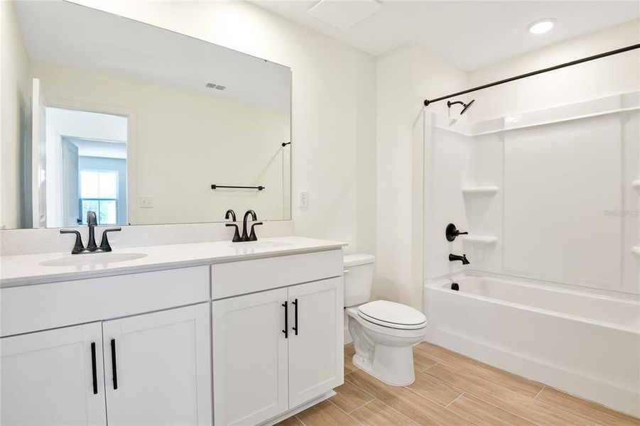 Furnished interior view inside a new home in Seasons at Wekiva Ridge, Mount Dora (Image 9). Furnished interior view inside a new home in Seasons at Wekiva Ridge, Mount Dora (Image 9).