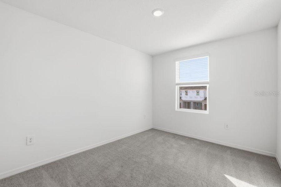 Spacious, unfurnished interior of a new home in The Towns at Firethorn, Parrish (Image 24).