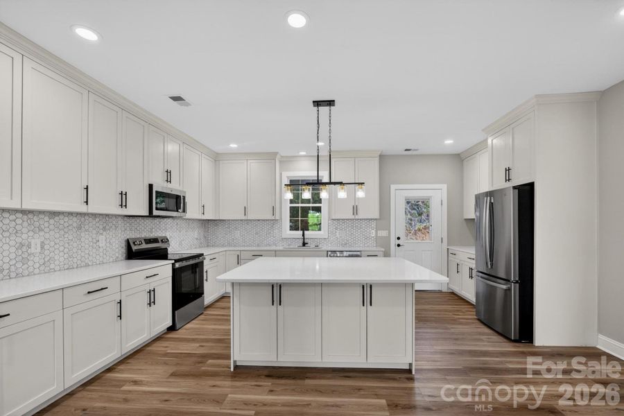 Furnished interior view inside a new home in , Lenoir (Image 30).