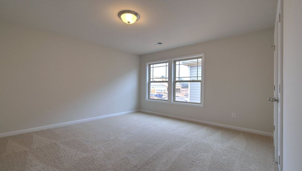 Spacious, unfurnished interior of a new home in Reserve at Tap Root Farms, Fletcher (Image 36).
