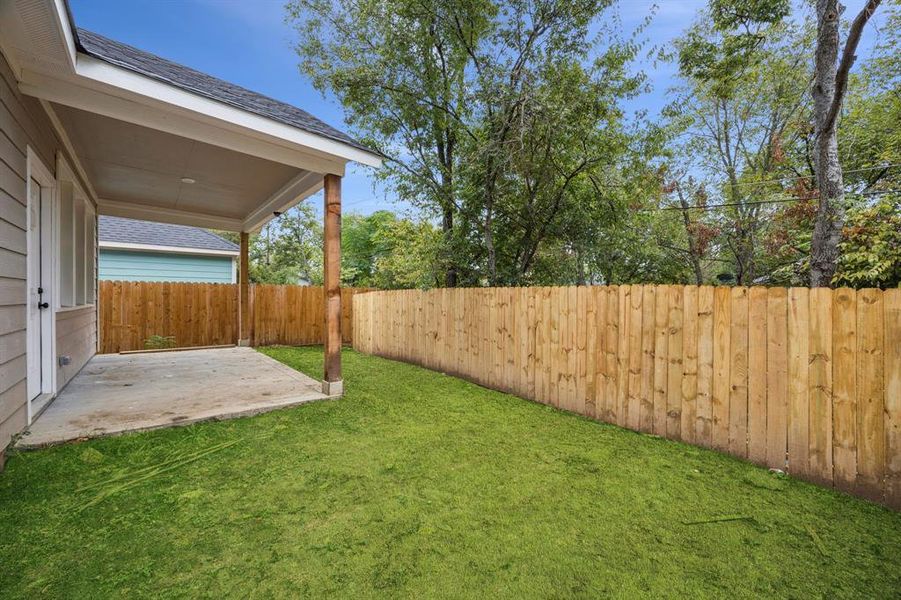 Fenced backyard featuring a patio Fenced backyard featuring a patio