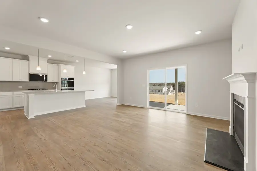A large kitchen with white walls. A large kitchen with white walls.