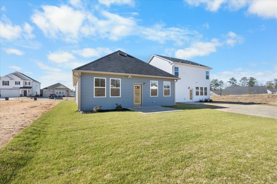 Exterior details and patio area of a home in Windsor, North Augusta (Image 25).