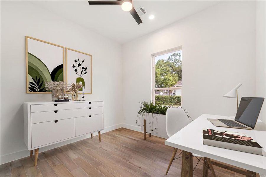 Bedroom #2, which can also serve as a study or be adapted for various other uses. Features a modern fan and recessed lights. (Virtually staged)