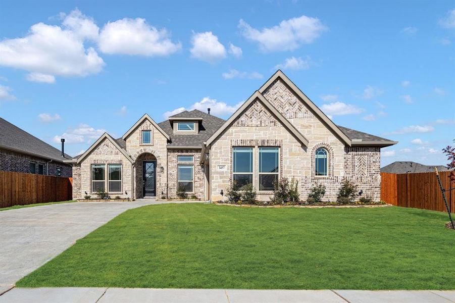 Front exterior of a new home in Mockingbird Heights Classic 60, Midlothian, TX, highlighting curb appeal (Image 25).