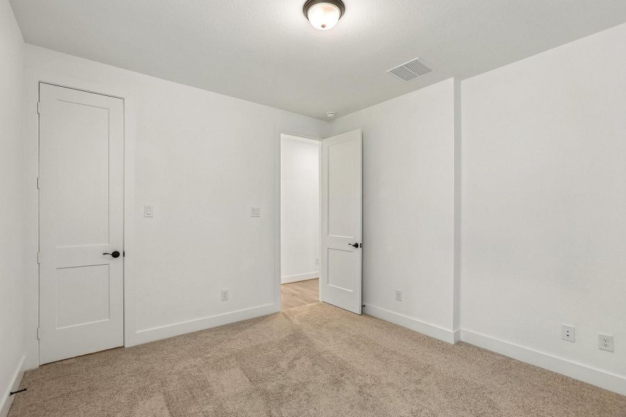 Spacious, unfurnished interior of a new home in The Highlands, Porter (Image 23).