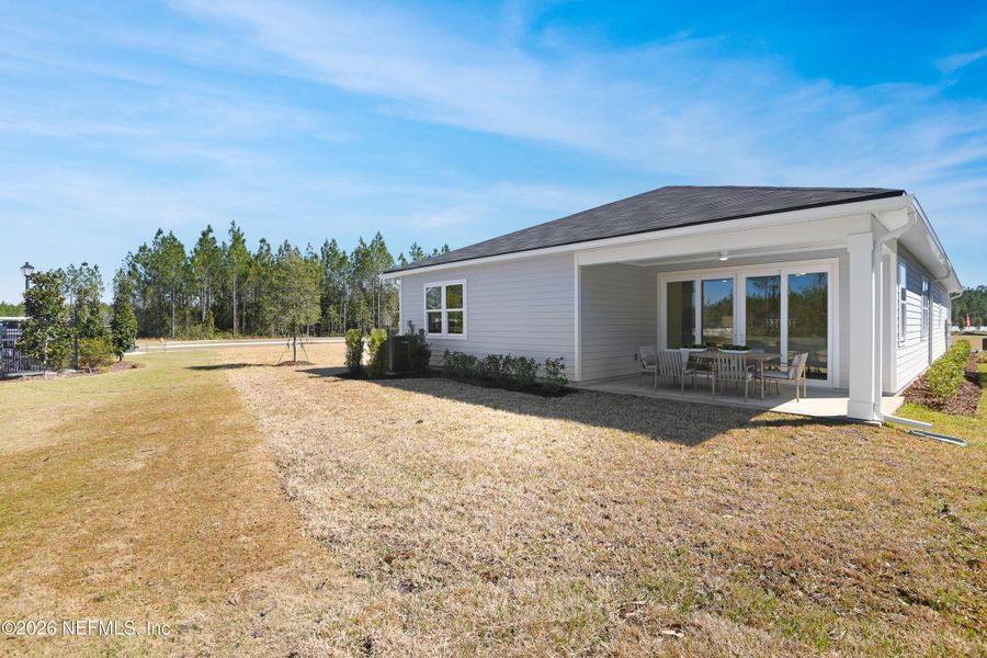 Exterior details and patio area of a home in Aspen Trail, Jacksonville (Image 3).