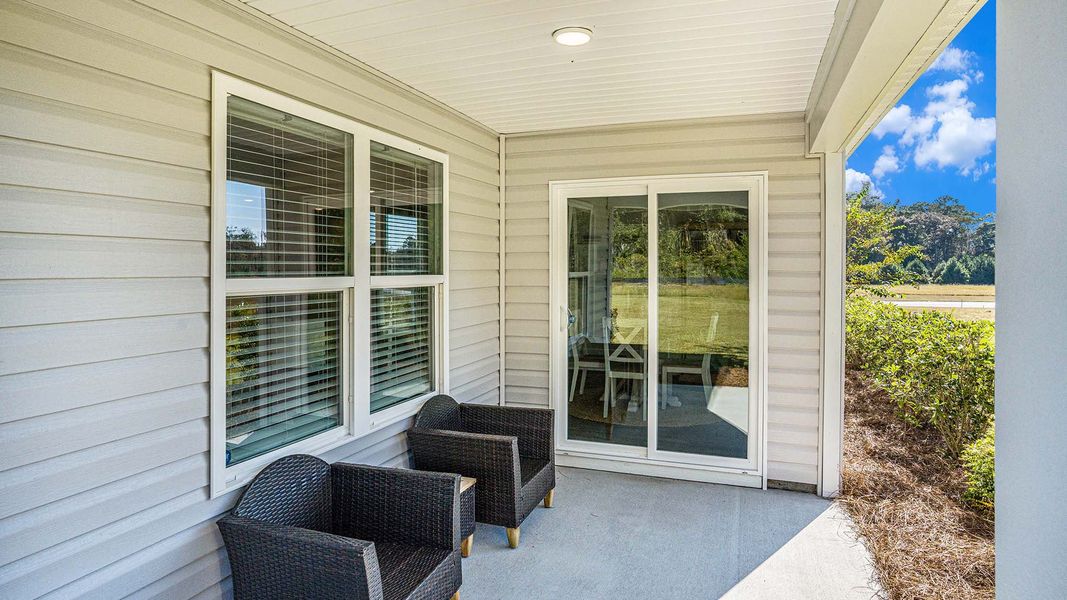 Exterior details and patio area of a home in Cottonwood Place, Tabor City (Image 3).