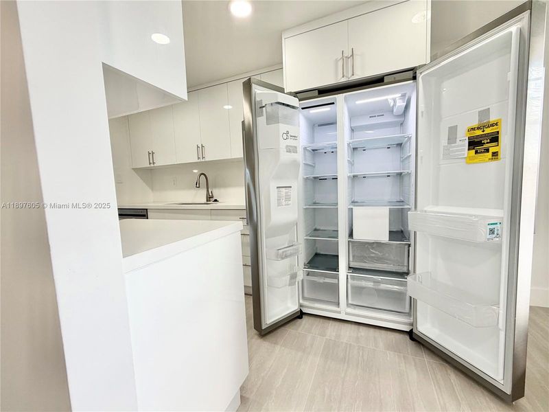 Furnished interior view inside a new home in , Lauderdale Lakes (Image 16).