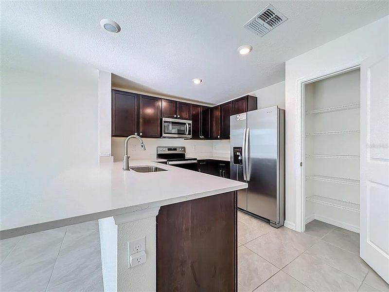 Furnished interior view inside a new home in The Towns at Laurel Commons, Ocala (Image 16).