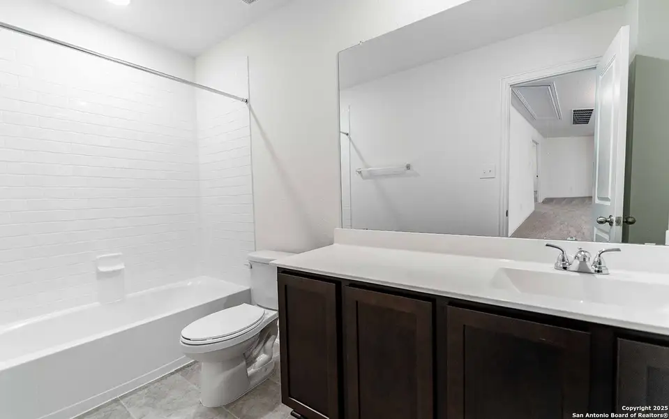 Furnished interior view inside a new home in Hunter's Ranch, San Antonio (Image 5).