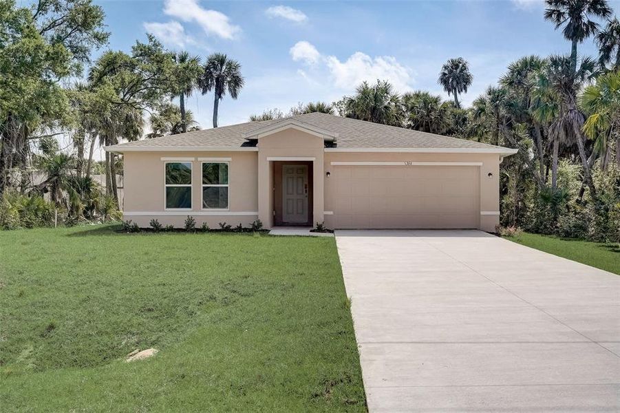 Front exterior of a new home in Citrus Springs, Citrus Springs, FL, highlighting curb appeal (Image 11).