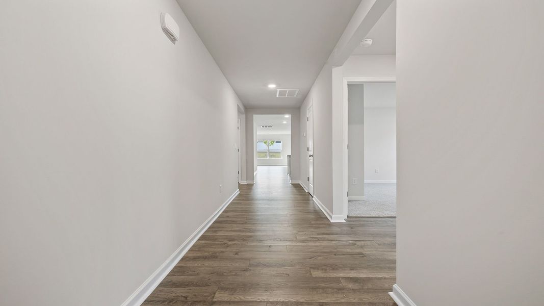 Spacious, unfurnished interior of a new home in Bentley Park, Greenwood (Image 14).