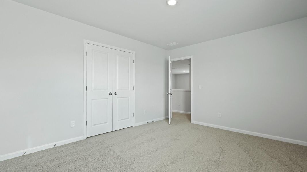 Spacious, unfurnished interior of a new home in Pine Hills at Cane Bay, Summerville (Image 22).