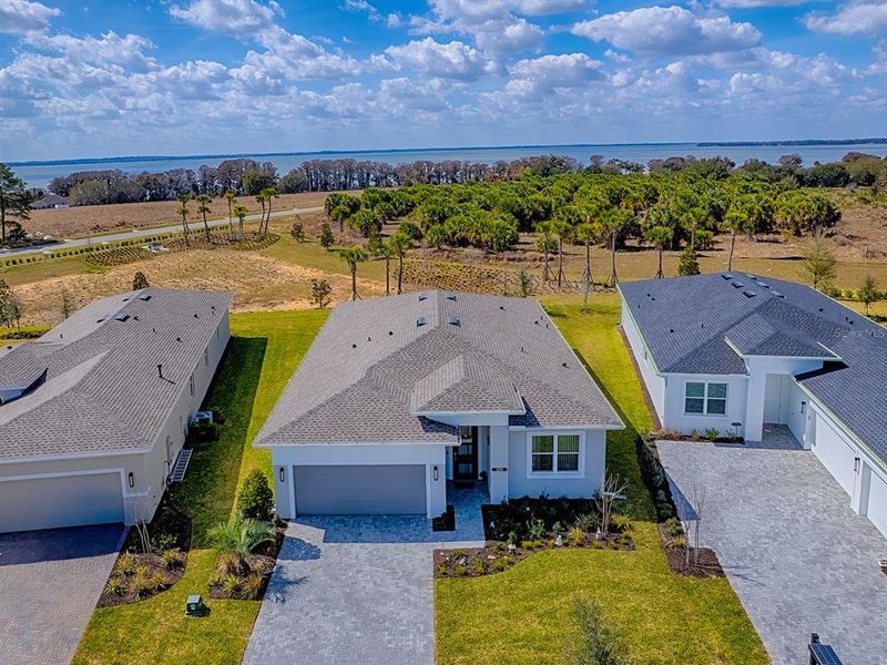 Front exterior of a new home in , Tavares, FL, highlighting curb appeal (Image 24).