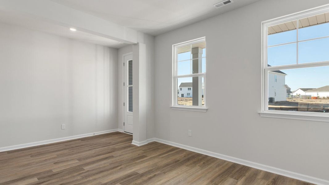 Representative unfurnished interior of a home built from the HARBOR OAK by D.R. Horton in Indigo Preserve, Leland (Image 19).