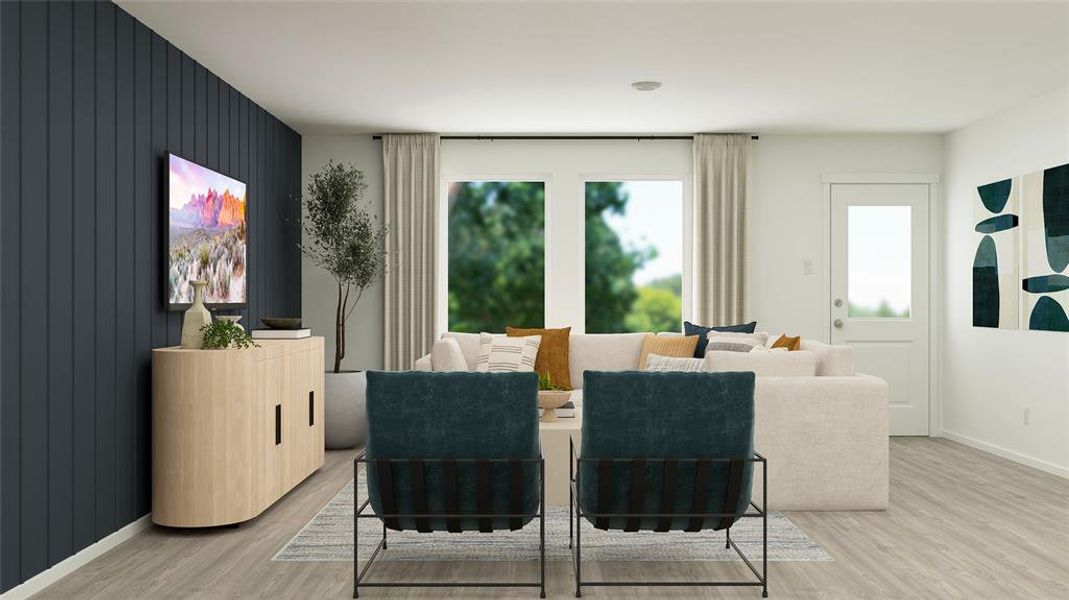 Dining area featuring wood walls and light hardwood / wood-style floors