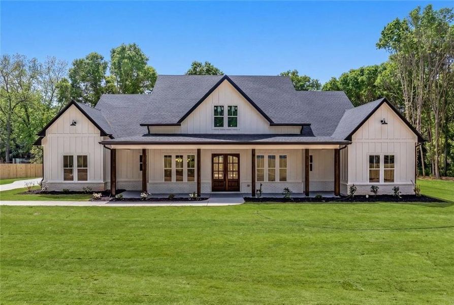 Front exterior of a new home in , Monroe, GA, highlighting curb appeal (Image 30).
