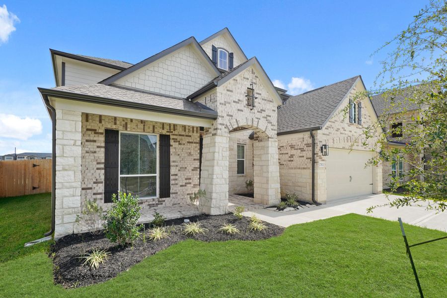 Front exterior of a new home in Morton Creek Ranch, Katy, TX, highlighting curb appeal (Image 15).