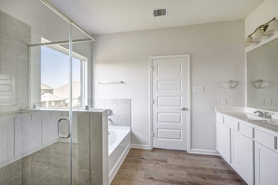 The McGinnis- Owner's Bathroom with Separate Walk-in Shower and Garden Tub The McGinnis- Owner's Bathroom with Separate Walk-in Shower and Garden Tub