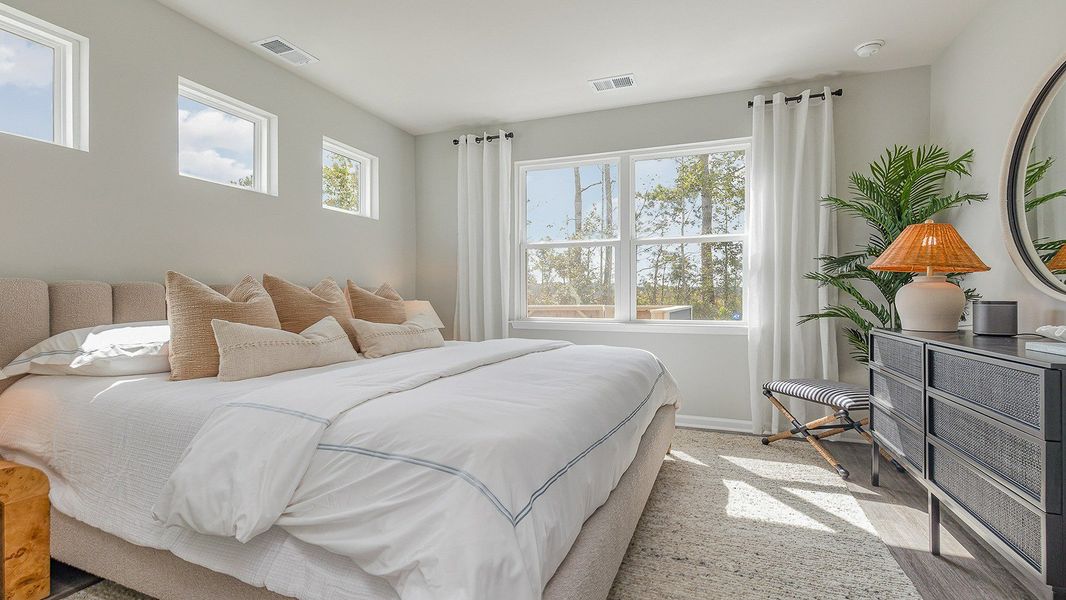 Furnished interior view inside a new home in Rich Square at Brunswick Plantation, Ash (Image 15).