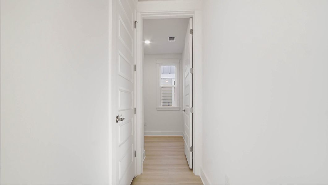 Representative unfurnished interior of a home built from the Ava by D.R. Horton in Parkside, Santa Rosa Beach (Image 20).