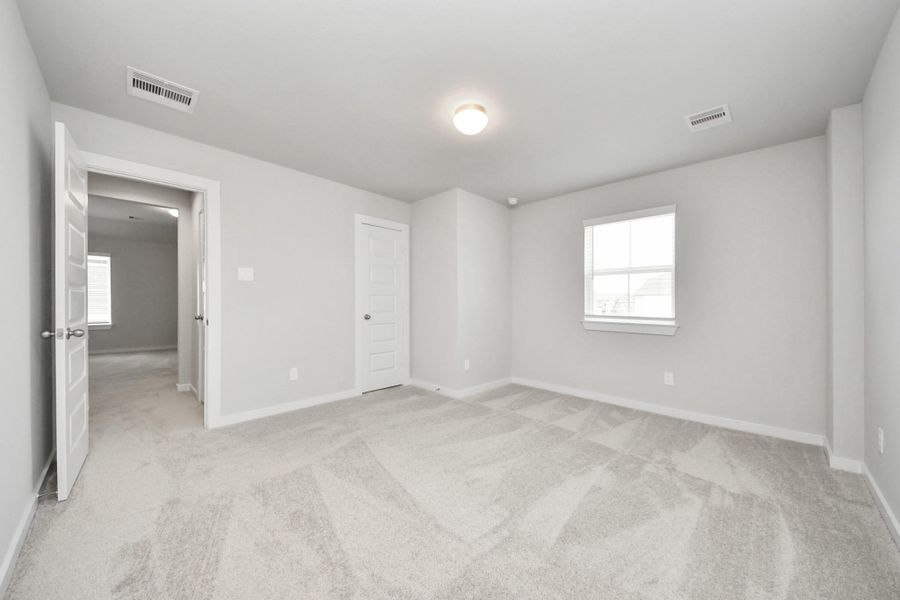 Generously sized secondary bedrooms featuring spacious closets, soft and inviting carpeting underfoot, large windows allowing plenty of natural light, and the added touch of privacy blinds for your personal retreat. Generously sized secondary bedrooms featuring spacious closets, soft and inviting carpeting underfoot, large windows allowing plenty of natural light, and the added touch of privacy blinds for your personal retreat.