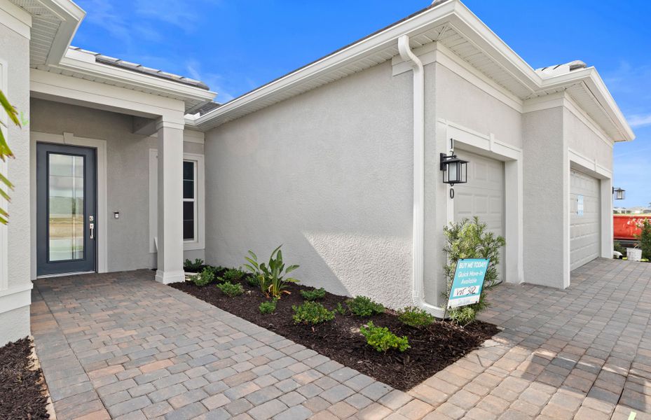 Exterior details and patio area of a home in Del Webb Oak Creek, North Fort Myers (Image 4).
