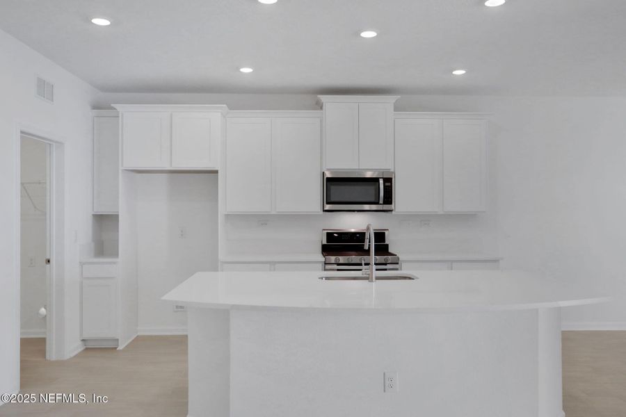 Furnished interior view inside a new home in Cordova Palms, St. Augustine (Image 13).