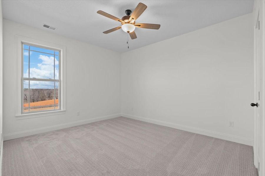 Representative unfurnished interior of a home built from the Converse by Enchanted Homes in Messer Farms, Inman (Image 34).