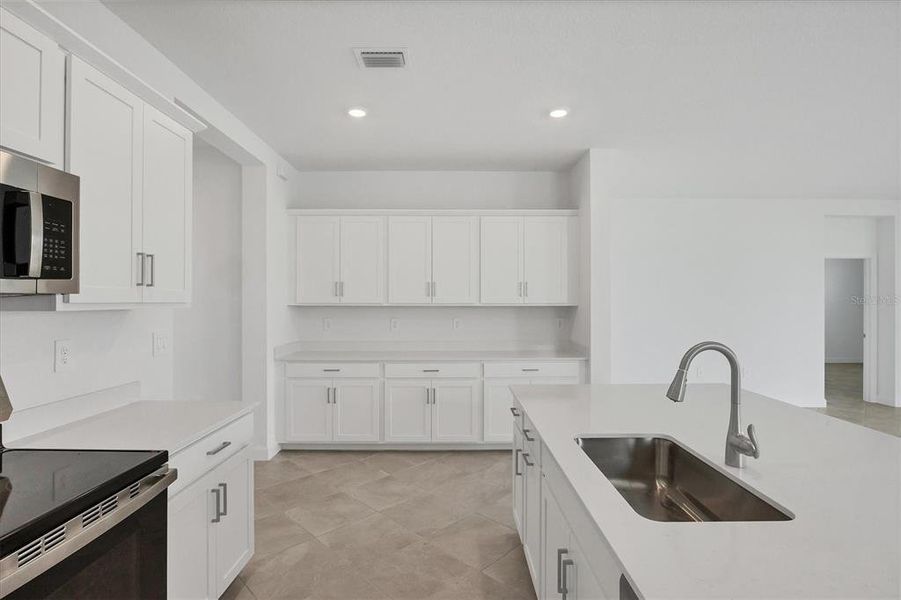Furnished interior view inside a new home in , Port Charlotte (Image 9).