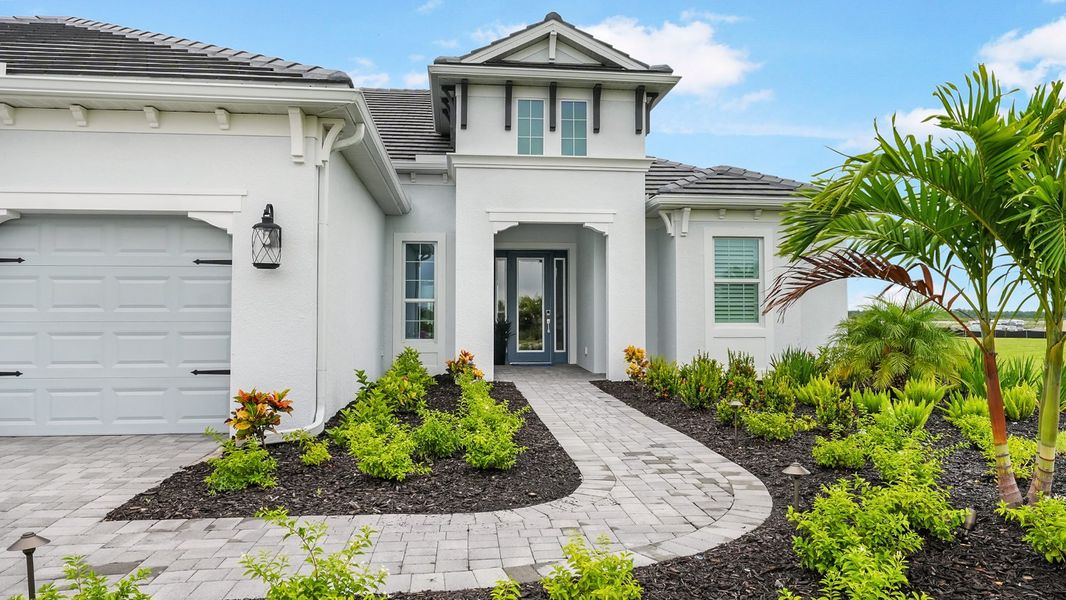 Representative exterior photo of a completed home built from the Captiva by Neal Communities in SkySail, Naples, FL (Image 21).