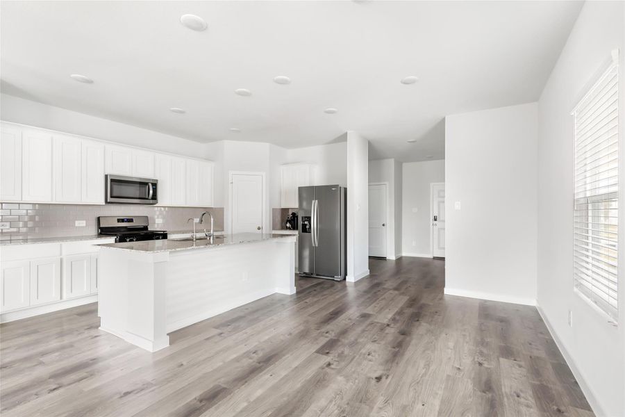 Furnished interior view inside a new home in Barrett Crossing, Crosby (Image 14).