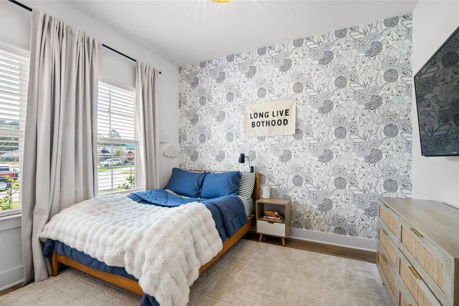 The downstairs bedroom is perfect guests or a home office!