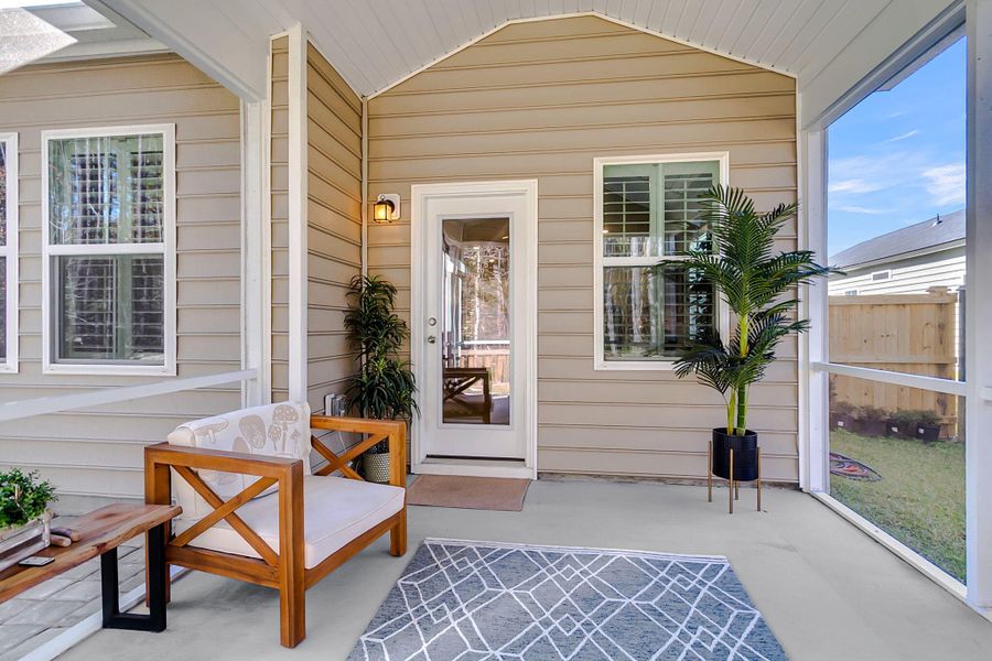 Exterior details and patio area of a home in Sweetgrass at Summers Corner: Arbor Collection, Summerville (Image 25).