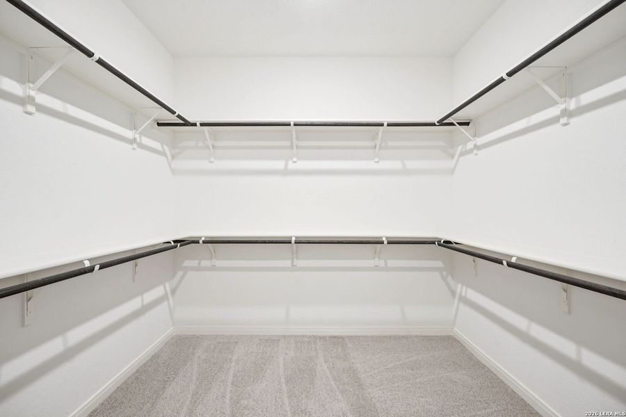 Spacious, unfurnished interior of a new home in Estancia Ranch - Classic Series, San Antonio (Image 50).