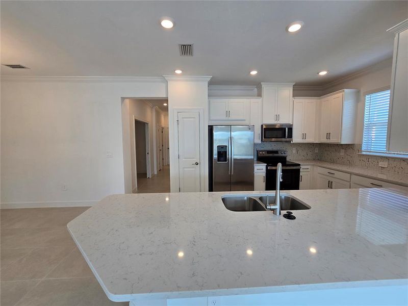 Furnished interior view inside a new home in The Cove at West Port, Port Charlotte (Image 8). Furnished interior view inside a new home in The Cove at West Port, Port Charlotte (Image 8).