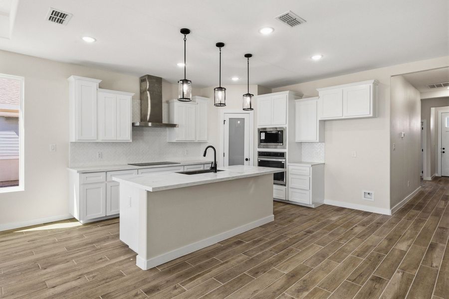 Furnished interior view inside a new home in The Heights at Riverbend II, Brownsville (Image 3).